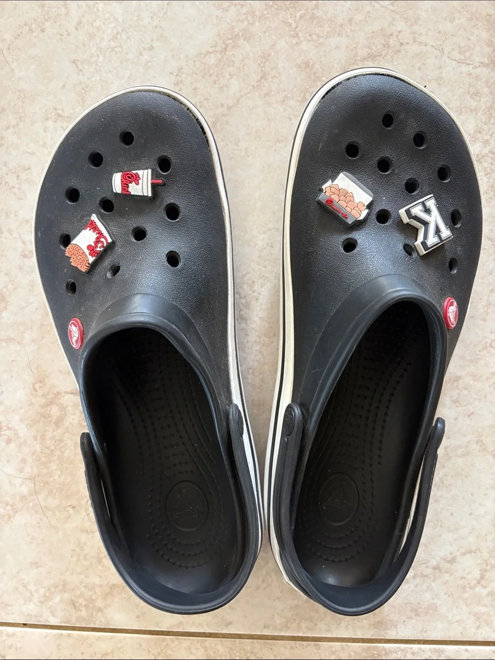 CROCS Men's Black Clogs with White Trim and Fun Jibbitz